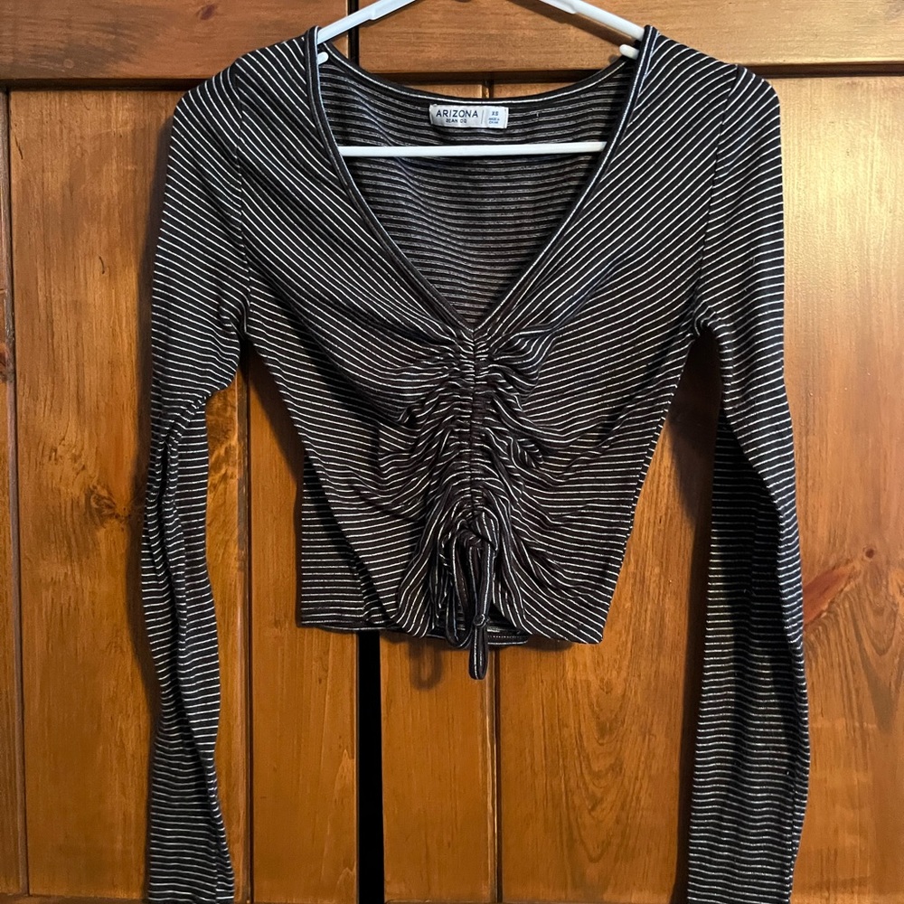 Long sleeved shirt. Black and white striped